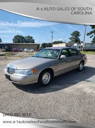 Image result for Light Parchment Gold 1999 Town Car