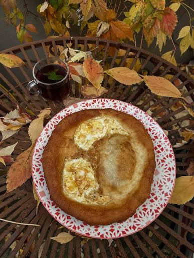 Honey topping for traditional Aseeda recipe served warm
