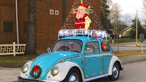 See the search faq for details. Vintage Vw Beetle Spreads Holiday Cheer With Strings Of Lights And Glowing Santa