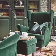 The Unmistakable Shape Of A Strandmon Wing Chair Complete With A Matching Dark Green Footstool Chosen He Green Chair Living Room Living Room Chairs Armchair