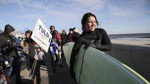 Tulsi Gabbard goes surfing in New Hampshire