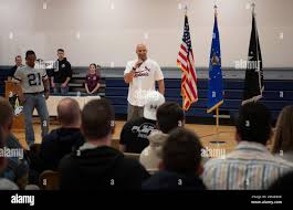 Chief Master Sgt. Robert Devall, former Space Base Delta 2 command chief,  addresses Team Buckley during a commander's call May 26, 2022 at Buckley  Space Force Base, Colo. Devall reminded the team