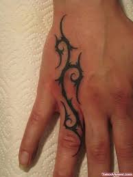 Tattoos are also an excellent way to show your love and appreciation for certain movements or ideologies. Tribal Tattoo On Hand And Finger