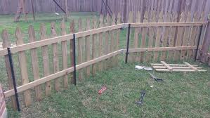 Building A Semi Permanent Fence Diy Garden Fence Diy Dog Fence Temporary Fence For Dogs
