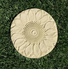 To add stepping stones to gardens or walkways, consider using stones that are made of wood instead of stone or concrete. 12 Pack Of Sunflower Stepping Stones Garden Artisans Llc