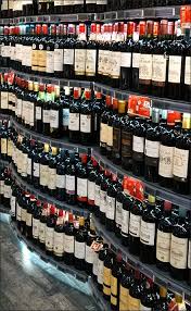 Euro Fixture Consecutive Gondola Curves Fixtures Close Up Wine And Spirits Store Small Utility Room Fixtures