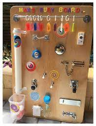 Home Made Busy Board Diy Busy Board Home Made Montessori Toys Homemademontessoritoys Home Mad In 2021 Toddler Activity Board Baby Activity Board Diy Busy Board