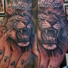 Top 30 Excellent Roaring Lion Tattoo Ideas January 2021 Roaring Lion Tattoo Lion Tattoo Lion Hand Tattoo