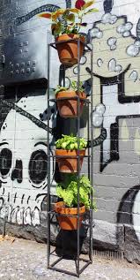 23.4'' h x 23.03'' l x 8.94'' d; Metal Planter Stands Vertical Space Saving Ideas Balcony Decoration Eco Friendly Garden Ideas Outdoor Metal Plant Stands Vertical Garden Vertical Herb Garden