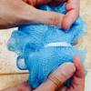 Knitted pouch for soap, or tawashi with moss stitch in drops paris. 1