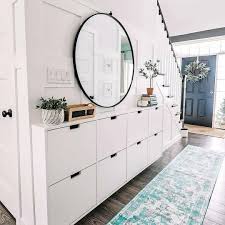 This list of 19 awesome entryway shoe storage ideas will help you on your path to a tidy and maybe even stylish entryway shoe system. I Get A Lot Of Questions About My Diy Narrow Entry Makeover Especially Since I Posted It On Tiktok Sw Hallway Wall Decor Entryway Shoe Storage Ikea Stall