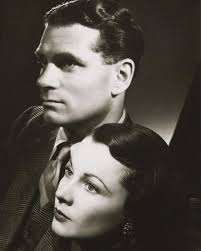 Vivien Leigh poses for the camera with her first husband, Herbert Leigh  Holman. He looks quite handsome in this photo and it's easy to see why she  fell for him. Holman also