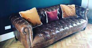Pair of timothy oulton balmoral heritage brown leather club armchairs. Brown Sofas Dfs