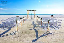 A Natural And Elegant Clearwater Florida Beach Wedding Setup With Ivory Draping And A Clearwater Beach Wedding Beach Destination Wedding Beach Wedding Packages