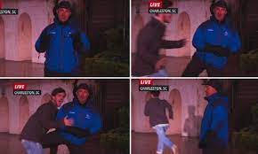 Student pounces on Weather Channel host Jim Cantore and gets kneed in  crotch | Daily Mail Online