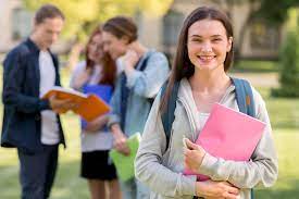 Free Photo | Pretty teenager happy to be back at university