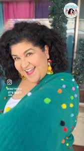 DIY POMPOM SWEATER! This is what happens when you get crafty inspiration  from a holiday TV special! Use fabric, glue and little pom-poms to liven up  a sweater for the holidays! #pompomsweater #pompoms ...