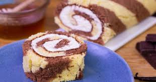 Preparez Un Gateau Roule Comme Un Pro Avec Nos Astuces Pour Le Dessert Cette Petite Gourmandise Parfumee A La Vani Recette Roule Patisserie Chocolat Vanille