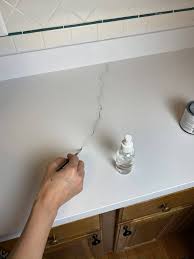 How to paint faux marble countertops with an epoxy countertop kit. How To Make Your Own Marble Countertops Love Remodeled