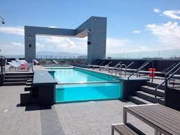 Rooftop Pool With Glass Edge Built By Cimarron Circleresized Copy Rooftop Terrace Design Rooftop Pool Pool Houses
