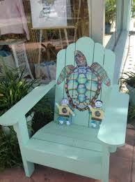 Enjoying A Rest In The Custom Painted Adirondack Chairs By Artist Nora Butler Adirondack Chairs Painted Painted Chairs Painted Furniture