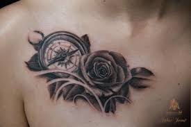 Rose Tattoos Are Always In Bloom Rose Tattoos For Men Rose Chest Tattoo Black And Grey Rose Tattoo
