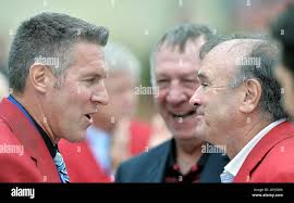 Sporting KC coach Peter Vermes, left, speaks with fellow Hall of Famer Pat  McBride after Vermes was inducted into the National Soccer Hall of Fame at  Sporting Park in Kansas City, Kansas,