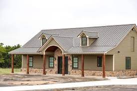 Burnished slate rawhide offers a natural gray finish with a subtle texture. Burnished Slate Metal Roofing Photos Mueller Inc Metal Roofs Farmhouse Metal Building Homes Tin Roof House