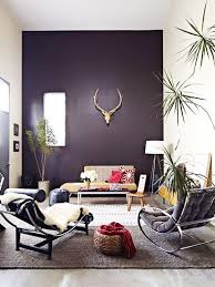 Forget Gallery Walls This Trend Is About To Be Big Again Interior Design Brown Accent Wall Home Decor