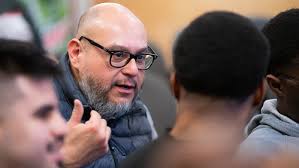 Barber Rich' delivers haircuts, life lessons during Titan Men of Diversity  Week