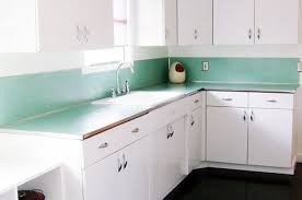 Wet a second cloth or sponge with clean water and wipe over all surfaces to remove residual cleaner. Design Sponge Blog Archive Sneak Peek Morgan Satterfield Metal Kitchen Cabinets Metal Kitchen Retro Kitchen