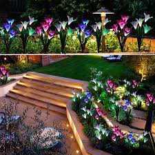 2 Pack Outdoor Solar Garden Stake Lights Coolmade Solar Powered Lights With 8 Lily Flower Multi Color Changing Led Solar Stake Lights For Garden Patio Back In 2020 Solar Lights Garden