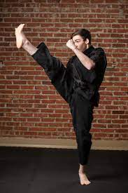 Justin deal front kick FMA Picture day - Enid Family Martial Arts