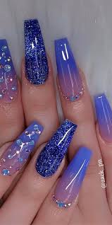 Professionally performed and acrylic blue nails pattern on nails can be done not only with the help of brushes, but also with the help of dots. Glitter Acrylic Nails