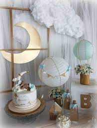 This Baby Boy Shower Theme Combines Travel And Hot Air Balloons For A Cute Up U 2019 This Baby B In 2021 Boy Baby Shower Themes Moon Baby Shower Moon Baby Shower Theme