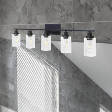 The bathroom vanity lighting you select depends on the size and layout of the vanity you're working with. 40 Inches Length 5 Light Bathroom Vanity Light Fixtures Black Wall Sconce Lighting With Clear Glass Shade Bonlicht Lighting