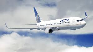 The seats of the 1st row are located close to the galleys and have no floor storage. United Boeing 737 First Class New York Newark Los Angeles Executive Traveller