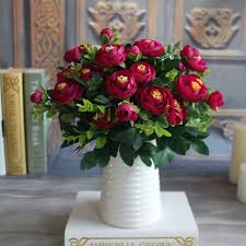 Another smart idea is to buy fake plants that mimic preserved varieties of real plants. 8 Ways To Make Fake Flowers Look Real Peony Flower Arrangements Artificial Flowers Wedding Cheap Artificial Flowers