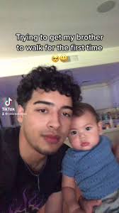 Helping Little Brother Walk