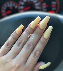 Each nail is also decorated with. Pastel Yellow Matted Coffin Or Ballerina Nails In Medium Length Acrylic Nails Pastel Ballerina Acrylic Nails Ballerina Nails