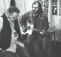 Quiet Days: Guy by Steve Earle & The Dukes.