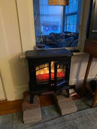 How much will using a fake stove cost to heat an 800sq foot house?