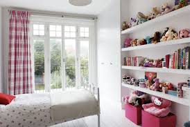 Everything about this nursery knocked my socks off! Stuffed Animal Storage Ideas