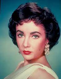 These rare photos show her purple (or are they blue?) eyes at their most stunning. Were Elizabeth Taylor S Eyes Purple Or Violet Had Double Eyelashes