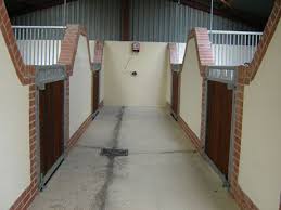 American barns are a popular alternative to traditional, exterior stabling. Pin On Stable Interiors
