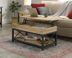 This lift top extendable coffee table has a rustic vibe that combines modern farmhouse with distressed oak craftsmanship. Steel River Lift Top Coffee Table Sauder 426153 Coffee Table For Small Living Room Coffee Table Living Room Table