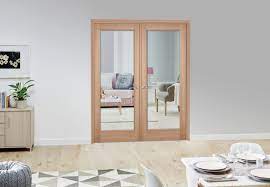 Newbury room divider sets have a unique action which allows the doors to fold back against interior walls creating real, uninterrupted, open space. Internal French Doors Stunning Wooden Interior French Doors