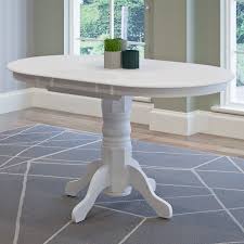 Maybe you would like to learn more about one of these? Corliving Dillon Extendable White Oval Pedestal Dining Table With 12in Butterfly Leaf The Home Depot Canada