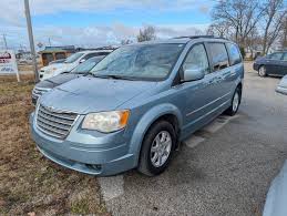 Image result for Light Ice Blue 2009 Town Car