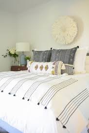 Add a refreshing pop of greenery to your white bohemian bedroom with hanging plants and potted palms. Boho Chic Summer Bedroom Tour Zdesign At Home